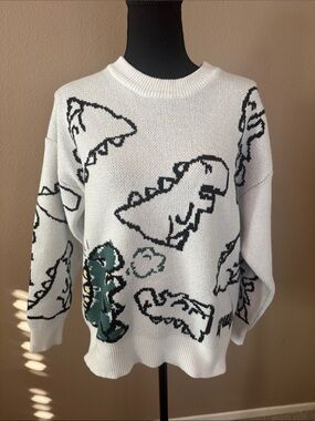 Unisex YWFG White Crewneck Sweater with Black Dino Outline and Green Accent